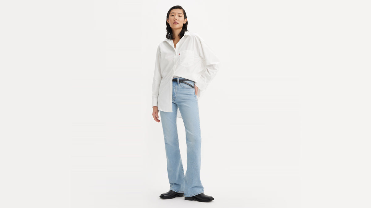 Light blue bootcut jeans styled casually