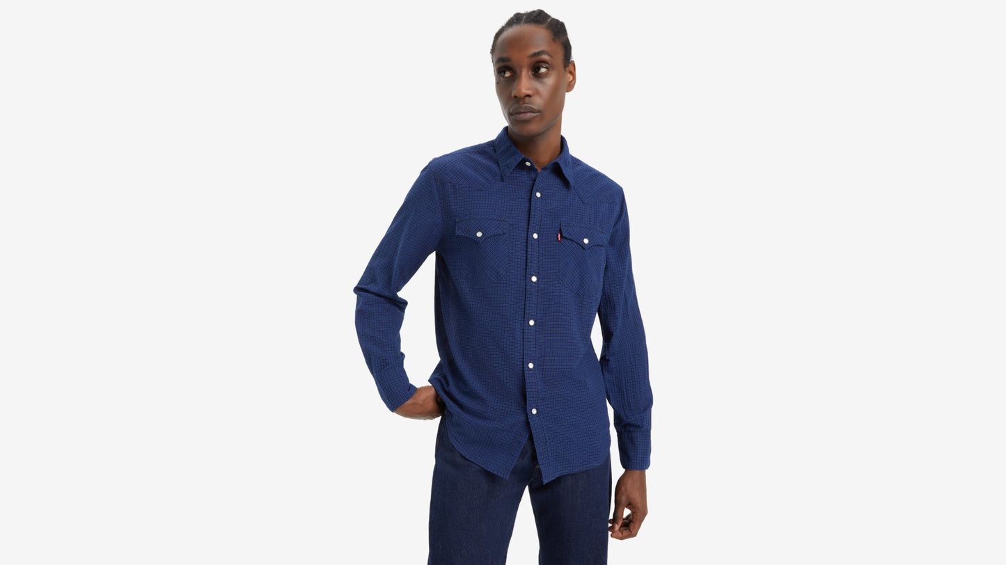 Man wearing a blue checkered button-up shirt with long sleeves & two chest pockets