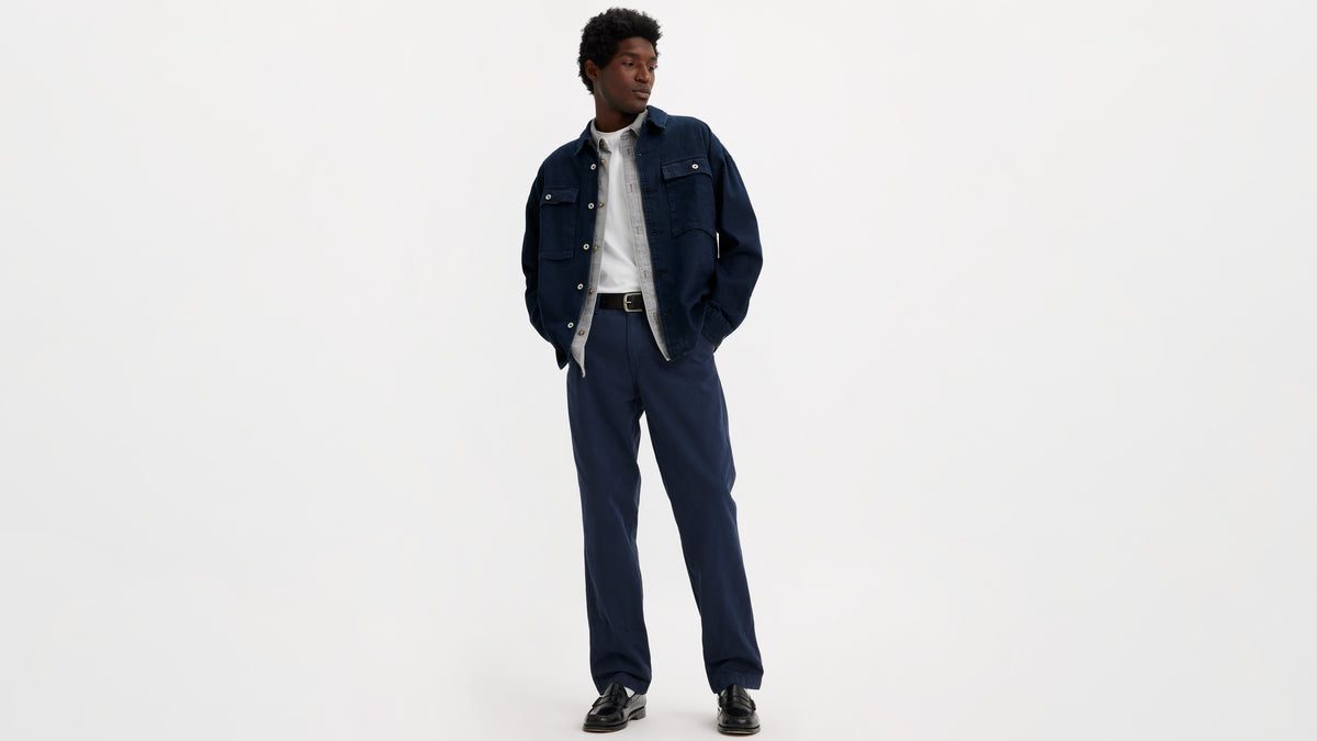 Levi's navy blue pants paired with a denim overshirt