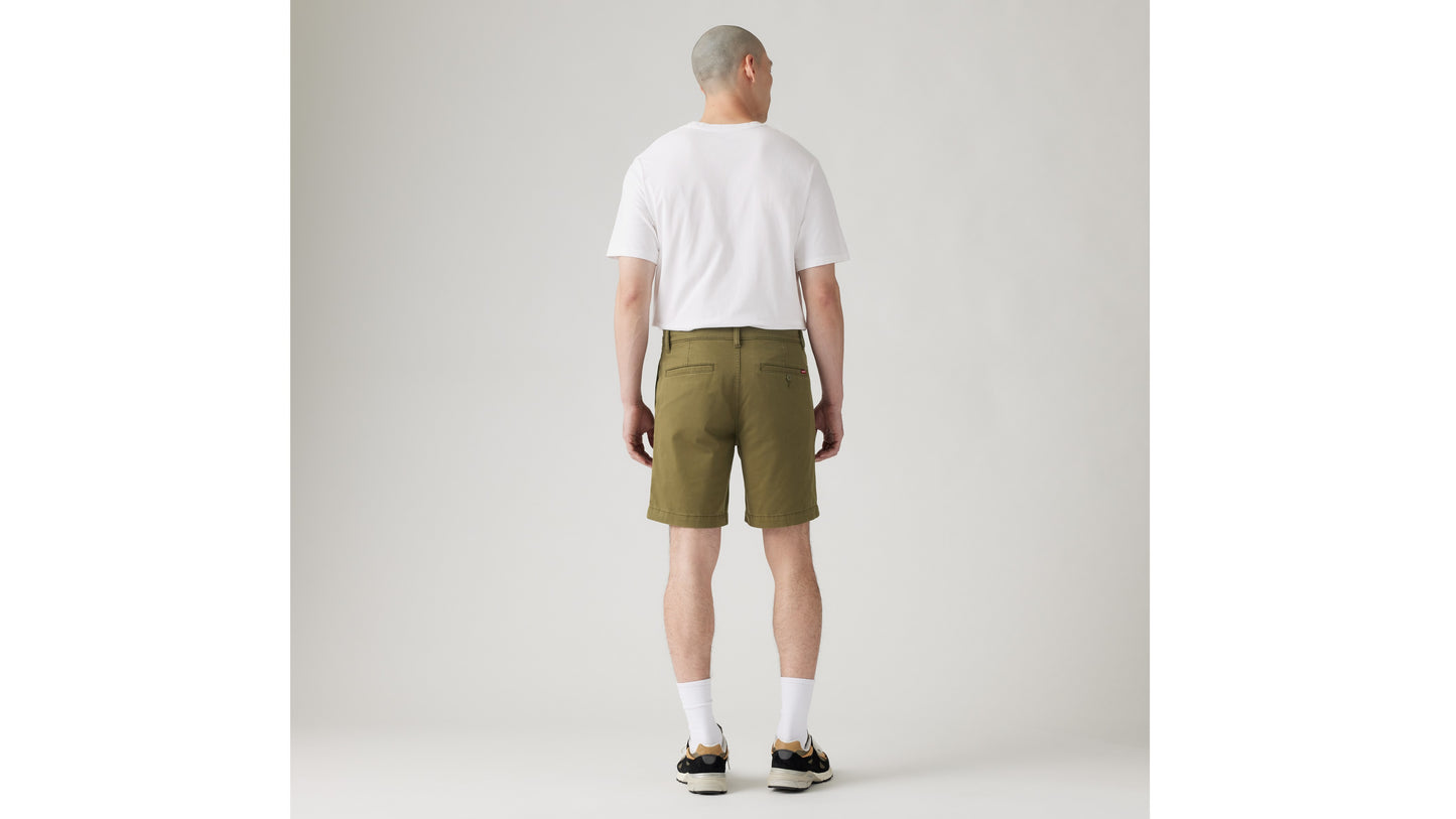 Back view of man in olive Levi's shorts