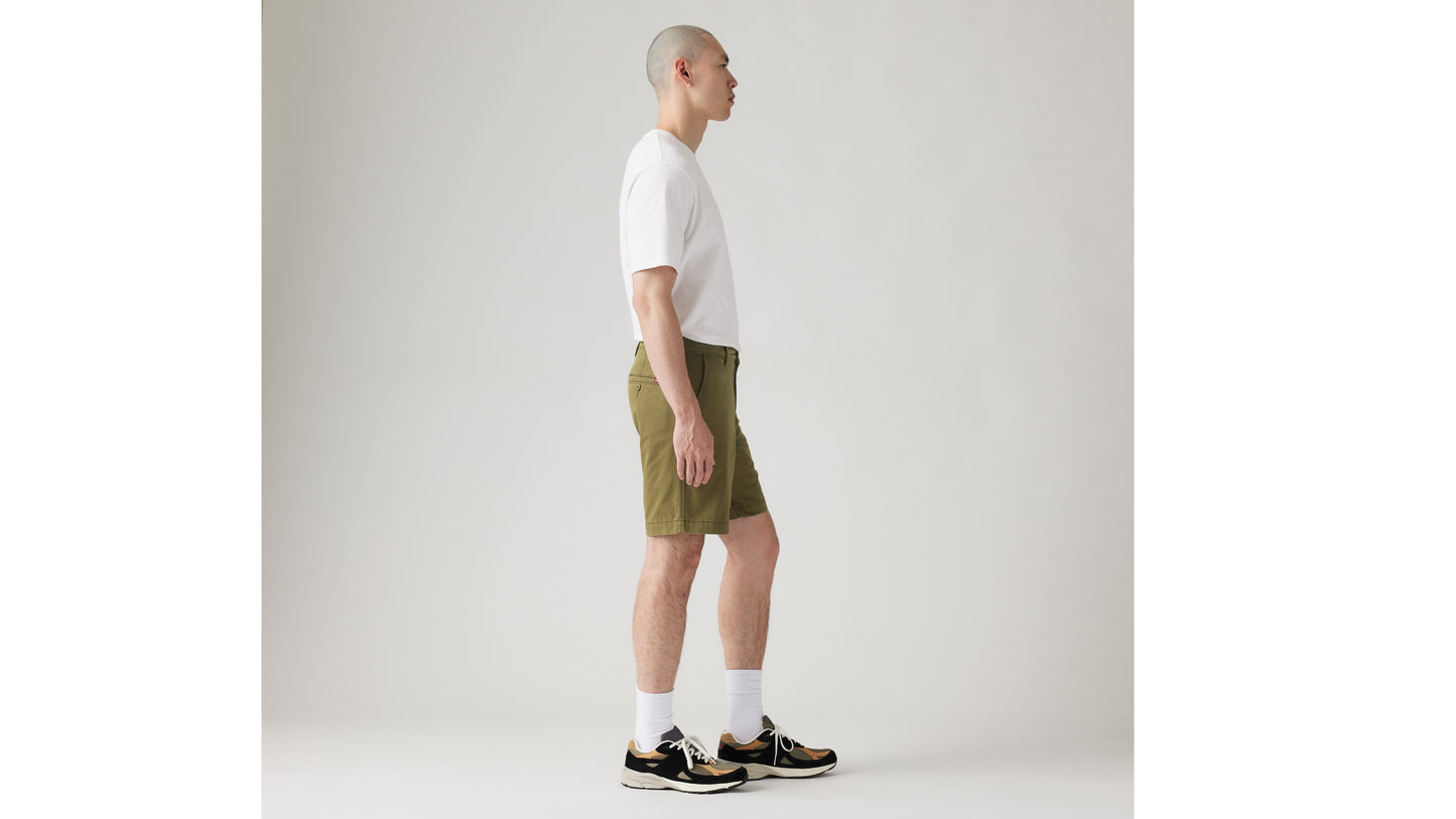 Side view of man in olive Levi's shorts