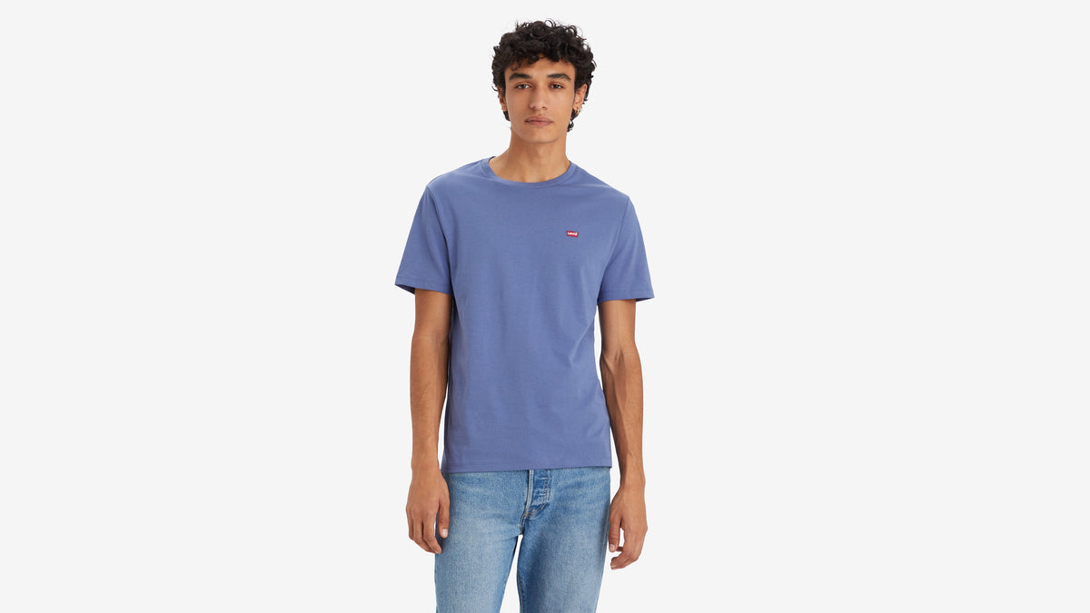 Front view of model in Levi's Men's Classic Housemark T-Shirt & denim jeans