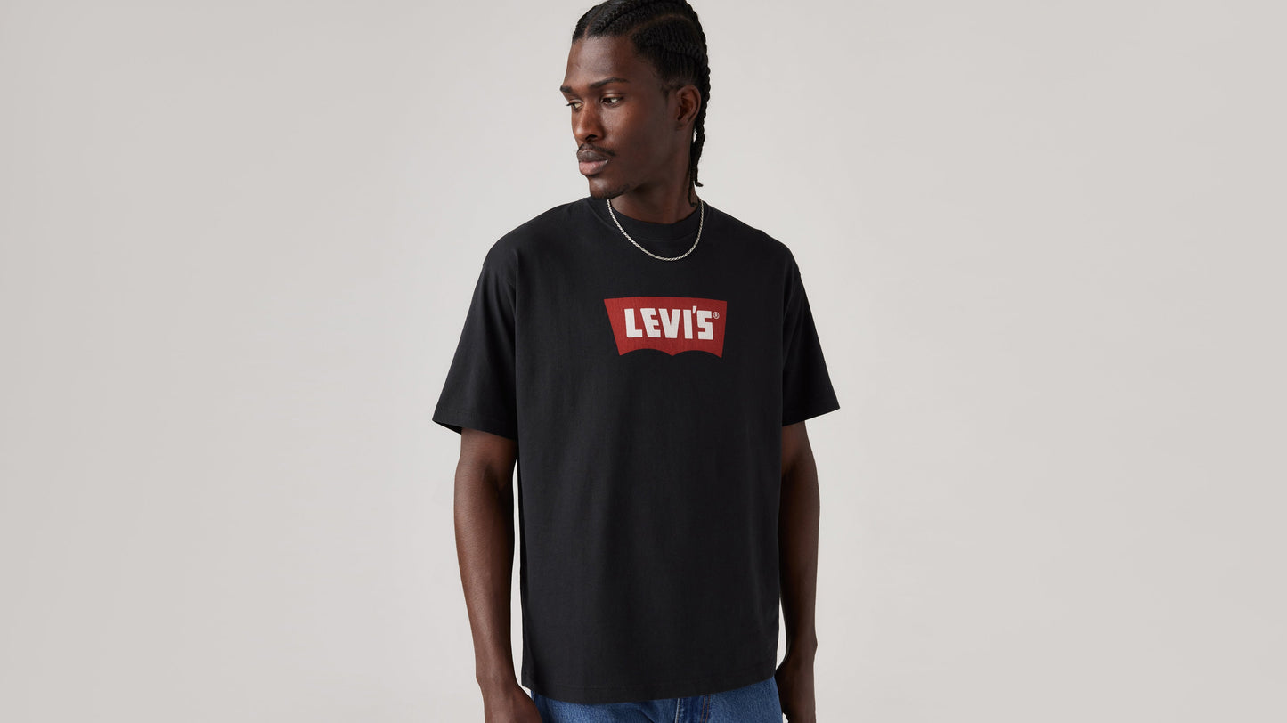 Front view of Levi's black vintage batwing graphic t-shirt styled with jeans