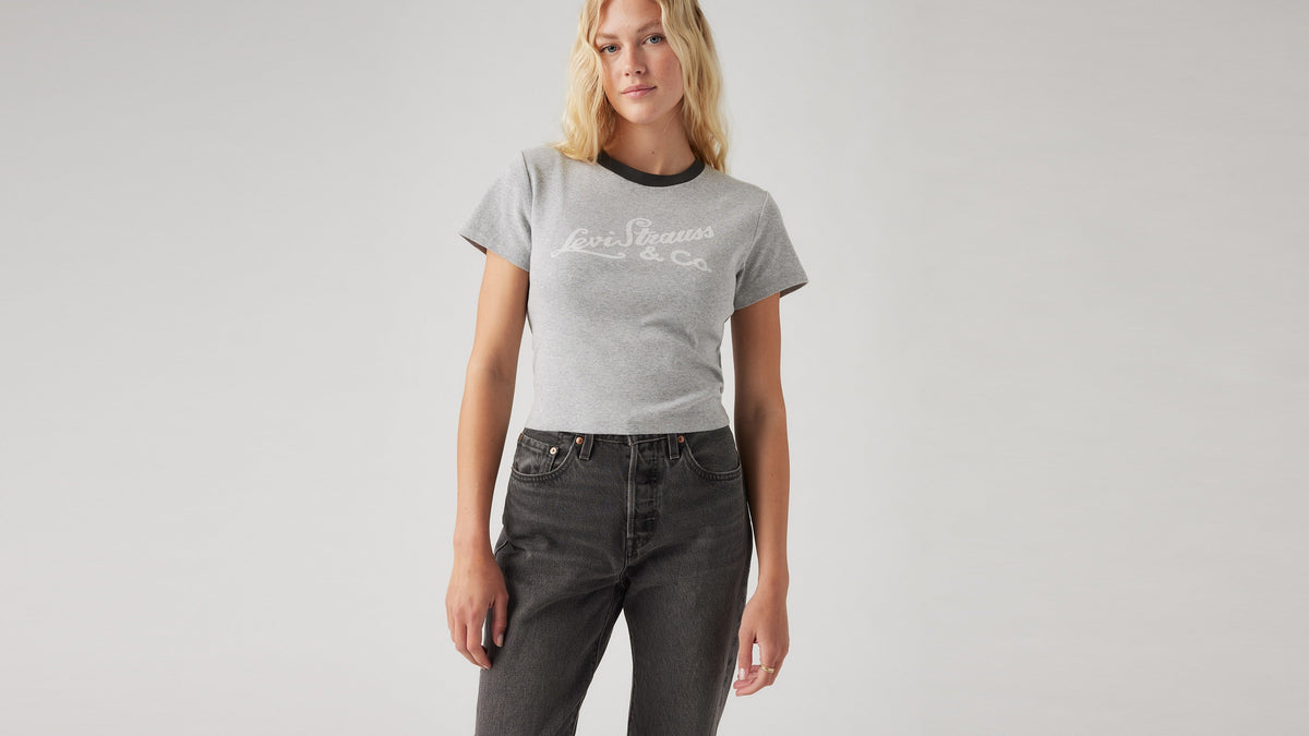 Woman wearing Levi's graphic sporty tee and black jeans