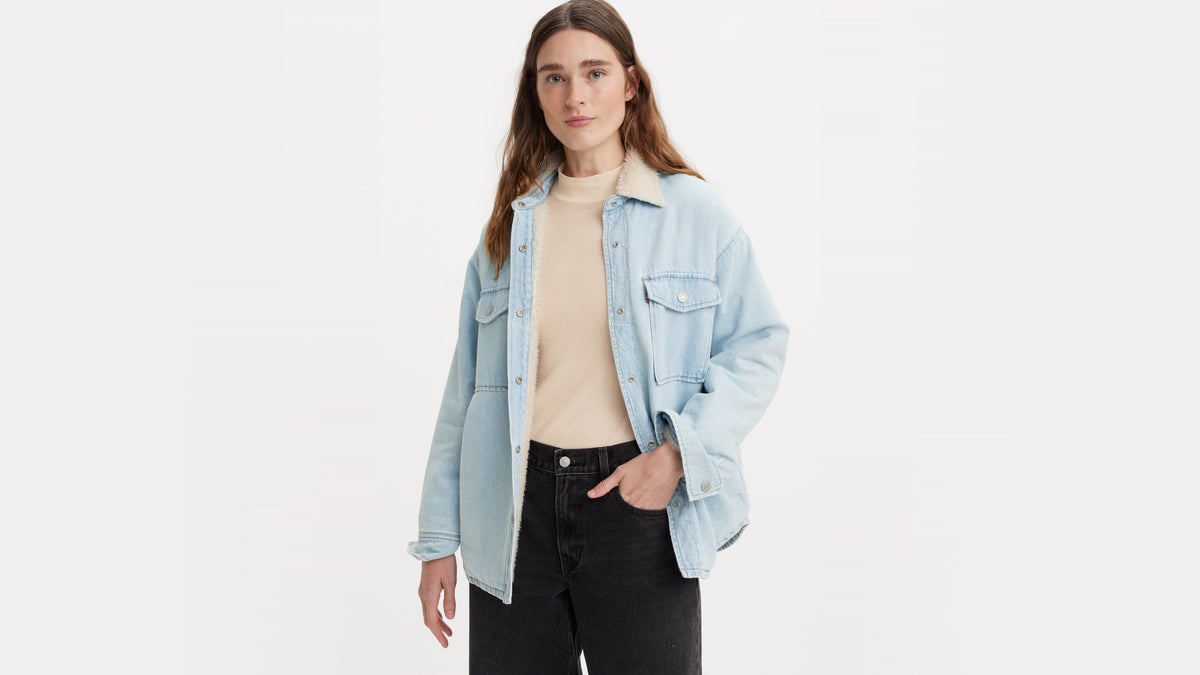 Woman in Levi's women's light wash Lola shacket